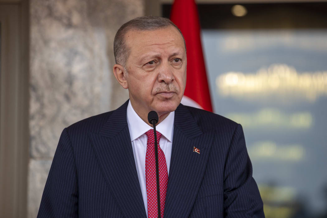 Turkish President Recep Tayyip Erdogan and President of Nigeria Muhammadu Buhari (not seen) hold a joint press conference after their meeting in Abuja, Nigeria on October 20, 2021.