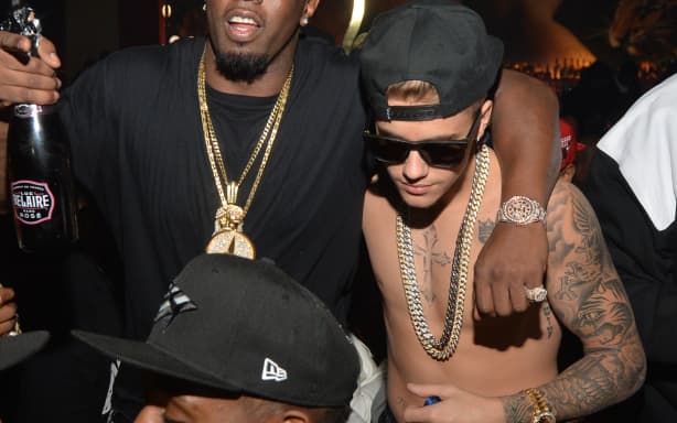 Sean ‘Diddy’ Combs and Justin Bieber attend Ciroc party at Vanquish Lounge on 5 February, 2014 in Atlanta, Georgia.
