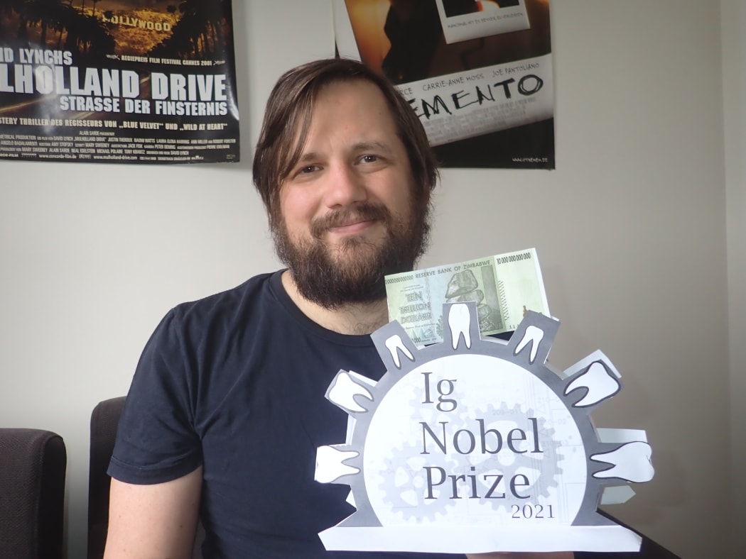 Dr Joerg Wicker with his Ig Nobel Prize