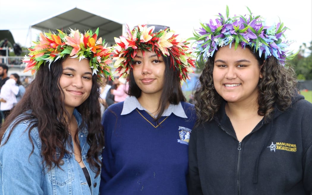 Faith Tepana (centre) after performing on the Cook Islands stage for James Cook High, supported by her cousins. - day 2 Polyfest 2021.