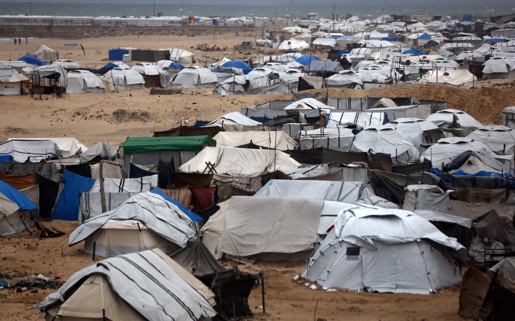 The tents of displaced Palestinians shelter them from the harsh winter conditions along the sea front in Gaza City, Palestine, on January 9, 2026. The majority of Gaza's 2.4 million people are displaced, often multiple times, by the war that begins with Hamas's attack on southern Israel on October 7, 2023. Many displaced people live in tent camps, raising serious concerns over winter. (Photo by Majdi Fathi/NurPhoto) (Photo by MAJDI FATHI / NurPhoto via AFP)