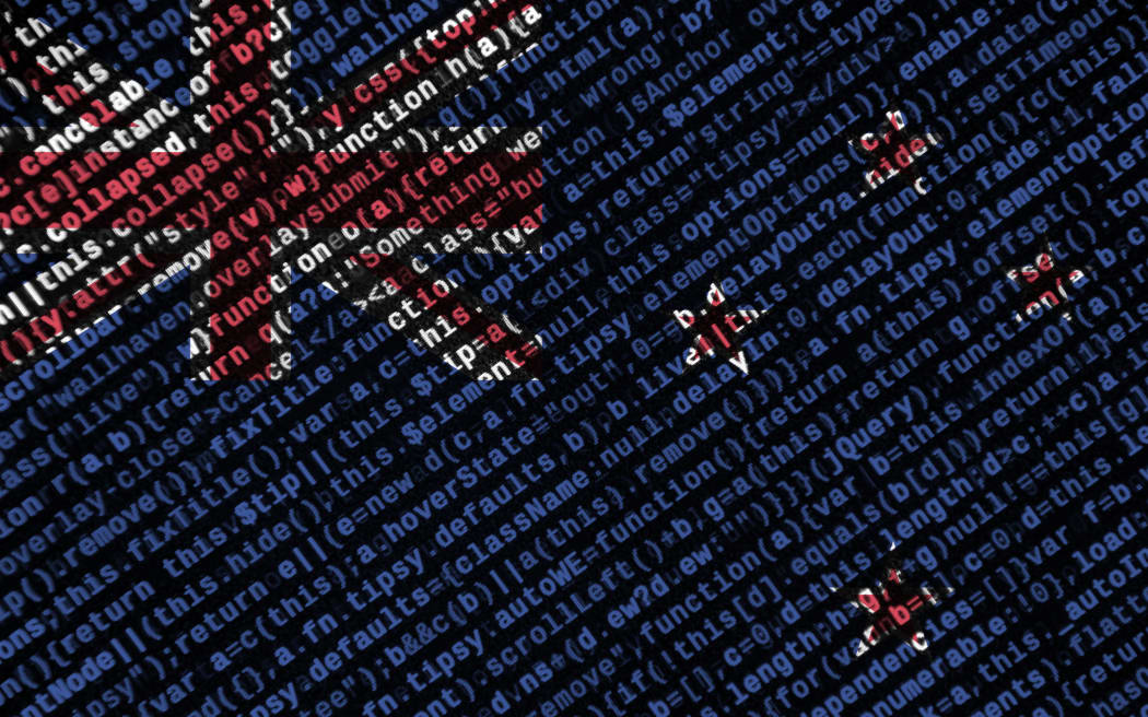 New Zealand flag  is depicted on the screen with the program code. The concept of modern technology and site development.