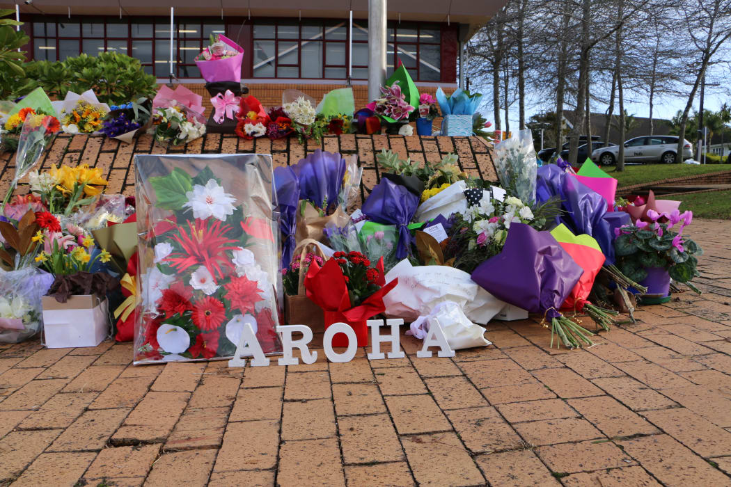 Flowers outside the Henderson police station in memory of Constable Matthew Hunt.