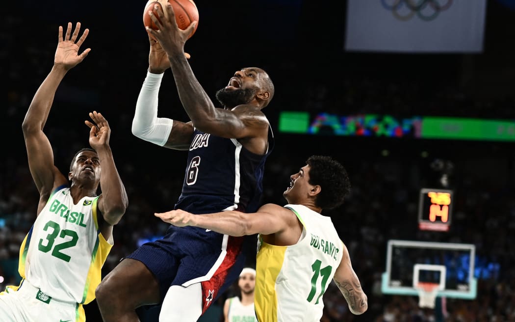 United States forward LeBron James goes to the basket in their Olympic Games semi-final against Brazil.