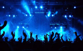 Hands in the air in concert