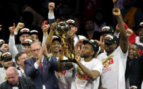The Toronto Raptors lift the NBA Championship trophy