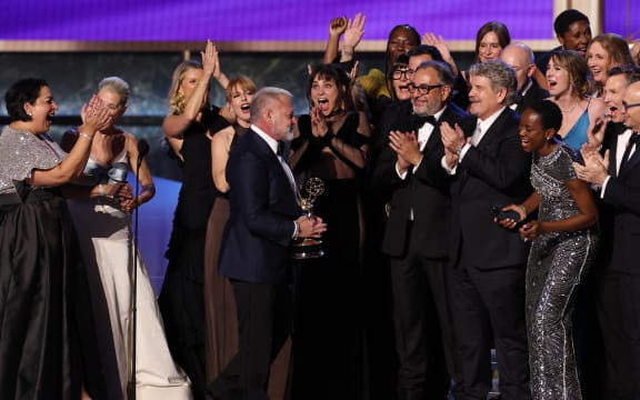 US writer producer R. Scott Gemmill holds the Outstanding Drama Series award for "The Pitt" during the 77th Primetime Emmy Awards at the Peacock Theatre at LA Live in Los Angeles on September 14, 2025. (Photo by VALERIE MACON / AFP) / RESTRICTED TO EDITORIAL USE