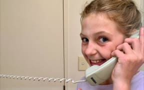 Summer Haycock's daughter talking on the family's landline.