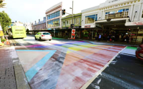 The rainbow crossing on Auckland's Karangahape Road was covered in white paint overnight. Rain overnight washed much of the paint away, but remnants could still be seen on the crossing, 28 March 2024.