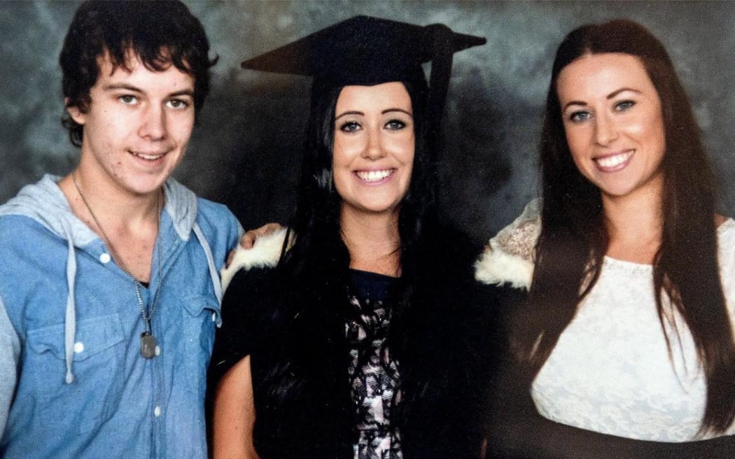 Archer, pictured here with her siblings during her university graduation, wants to be treated as the intelligent adult she is.
WARWICK SMITH / WARWICK SMITH / MANAWATU STANDAR