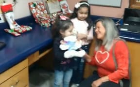 An Arizona couple granted the wishes of a pair of Mexican girls who had floated a balloon over the border with their Christmas list.