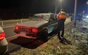 Police pull over a car in Hawke's Bay.