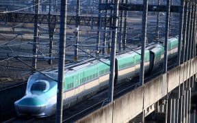 A Shinkansen bullet train derailed in Shiroishi, Miyagi prefecture after a 7.3-magnitude quake jolted northeast Japan.