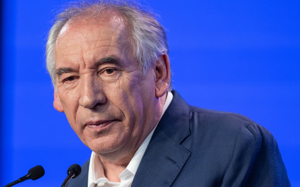 (FILES) France's centrist Democratic Movement (MoDem) party leader Francois Bayrou delivers a speech during the MoDem summer university in Guidel, western France, on September 29, 2024. - France is headed into a new political crisis on December 3, 2024, as opposition lawmakers vowed to topple the minority government of Prime Minister Michel Barnier in a no-confidence vote after just three months in office. If the government falls, it would be the first successful no-confidence vote since a defeat for Georges Pompidou's government in 1962, when Charles de Gaulle was president. If the vote passes, French President Emmanuel Macron will have to name a new Prime Minister. Speculations on future successors have floated the names of French Minister of Defence Sebastien Lecornu, or the centrist politician and former presidential candidate Francois Bayrou. (Photo by FRED TANNEAU / AFP)