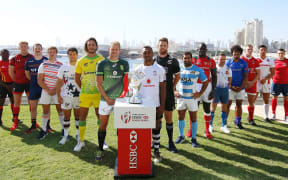 The men's captains pose ahead of the World Series opener in Dubai.