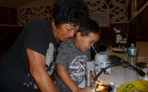 Kohupatiki Marae kuia Aki Paipa shares her geological knowledge with her mokopuna.