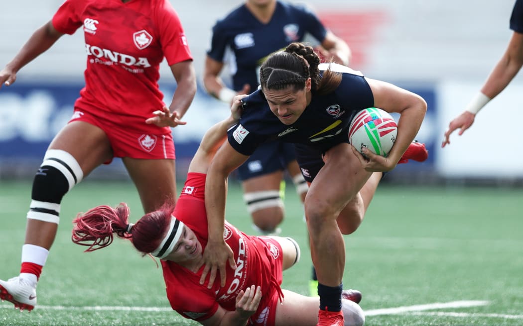 USA's Ilona Maher charges through the Canada defence at a world series tournament in Langford.