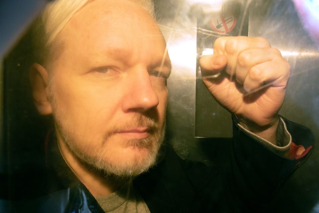 Julian Assange arrives at court in London on 1 May 2019 to be sentenced for bail violation.