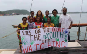 Save the Children Vanuatu NextGen Youth Ambassadors and youth climate activists demonstrating ahead of the historic International Court of Justice Advisory Opinion on Obligations of States in respect of Climate Change.