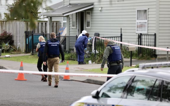 Police and forensics have cordoned off the cul de sac at the end of Coburg St in Henderson after an alleged stabbing overnight.