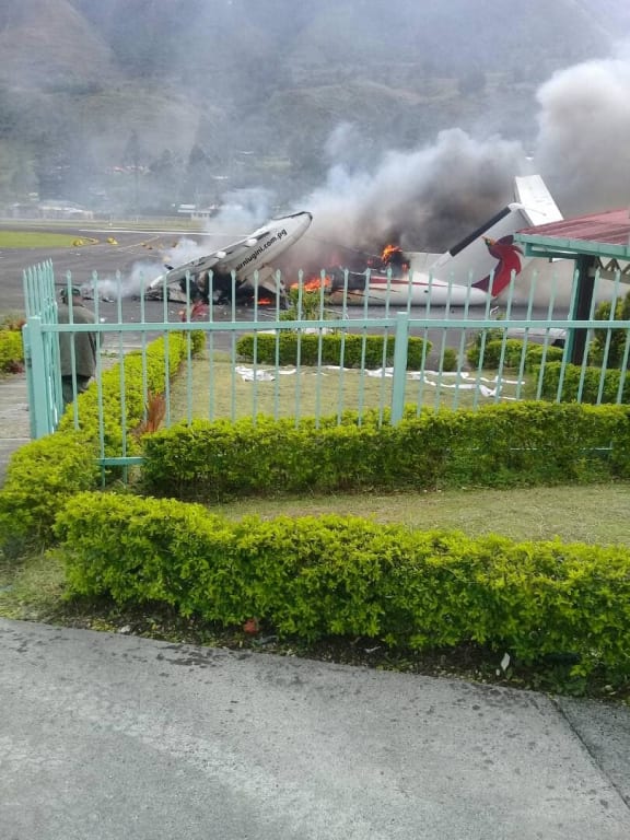 The destroyed Air Nuigini Dash 8 at Mendi Airport