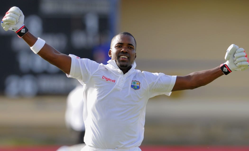 The West Indies batsman Darren Bravo celebrates.