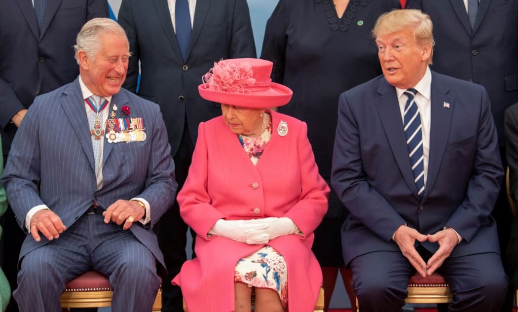 Britain's Prince Charles, Queen Elizabeth II and US President Donald Trump pose for the official family photograph during an event to commemorate the 75th anniversary of the D-Day landings, in Portsmouth.