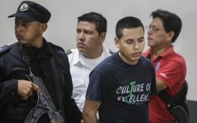 Evangelical pastor Juan Rocha arrives in court under escort to be sentenced to 30 years of imprisonment for the abduction and murder of Vilma Trujillo
