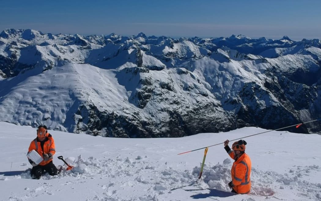 Some of the avalanche team completing snow tests to see what snow layers and types are building as winter progresses.