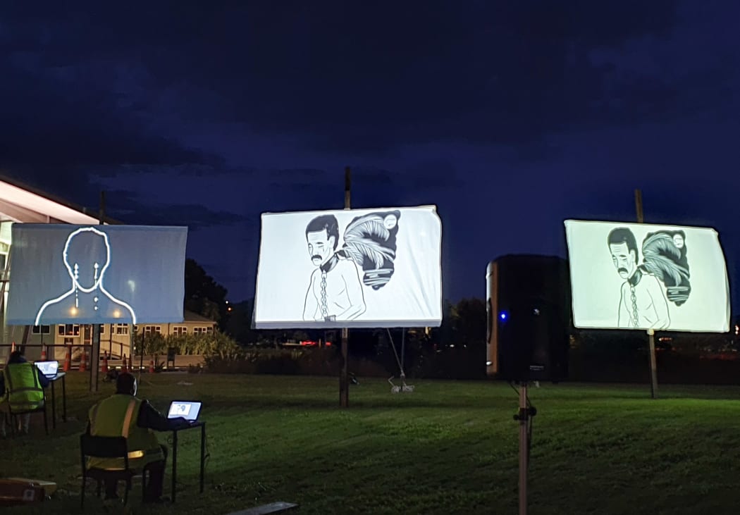 Cry of the Stolen People - three sails with projection images