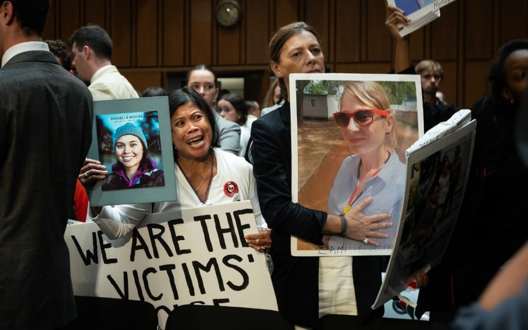 Families of the victims of Ethiopian Airlines flight 302, a Boeing 737 Max 8 that crashed in 2019, attend a Senate Energy and National Resources Committee hearing on the company’s safety culture, following a number of incidents on Boeing airplanes, Washington, DC, on 18 June, 2024.