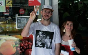 Tom Scott and Music 101 reporter outside Scott's favourite Melbourne juice joint.