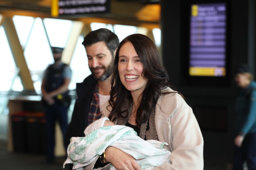 Jacinda Ardern arrives in Wellington with baby Neve and partner Clarke Gayford.