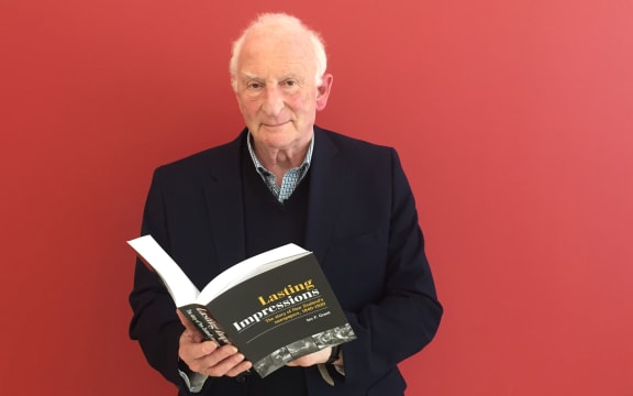 Ian F Grant with his new book covering 80 years of new Zealand newspaper history.