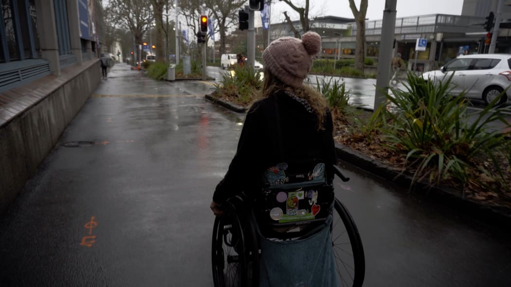 Pieta Bouma wheels down Auckland's Symonds Street.