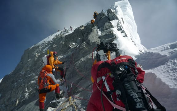 Crowding on the Hillary Step - with conflict not far behind.