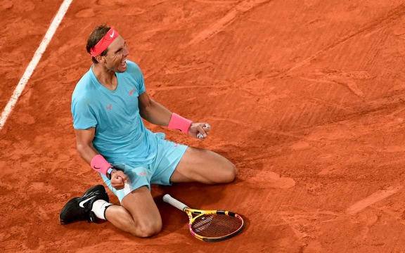 Rafael Nadal celebrates winning the men's singles final of the Roland Garros French Tennis Open 2020.