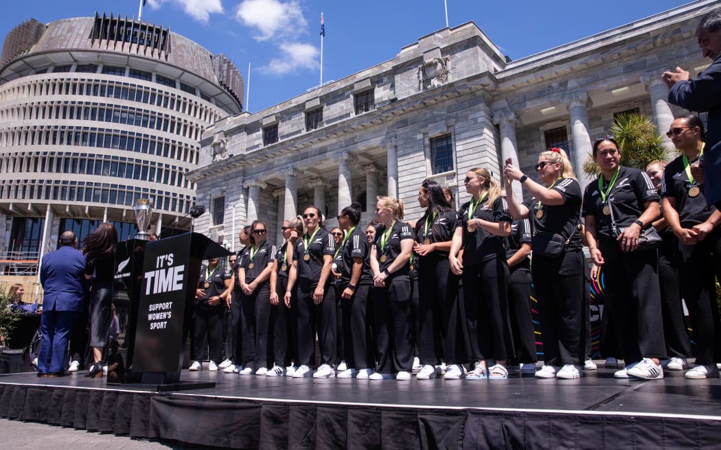 Fans celebrate the Black Ferns at an event at Parliament