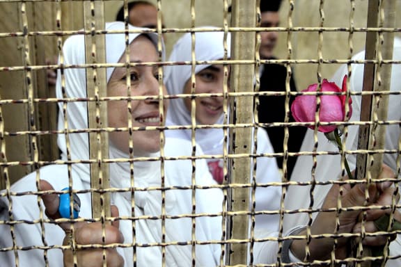 The girls and women will be released after a court cut their sentences.