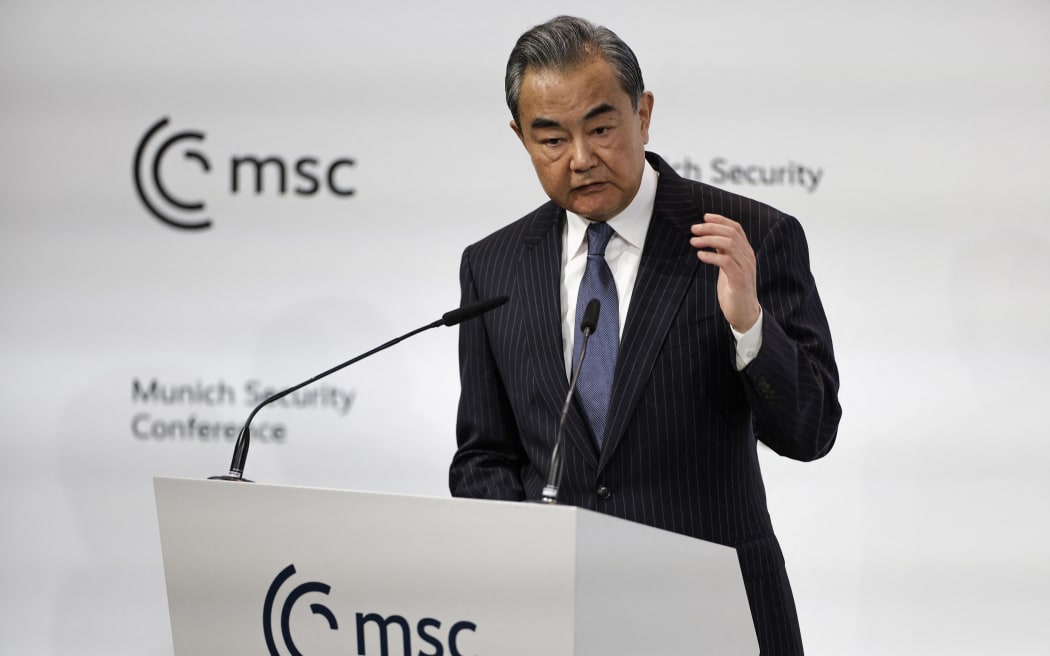 China's Director of the Office of the Central Foreign Affairs Commission Wang Yi delivers a speech at the Munich Security Conference (MSC) in Munich, southern Germany, on February 18, 2023. - The Munich Security Conference running from February 17 to 19, 2023 brings world leaders together ahead of the first anniversary of Russia's invasion of Ukraine as Kyiv steps up pleas for more weapons. (Photo by Odd ANDERSEN / AFP)