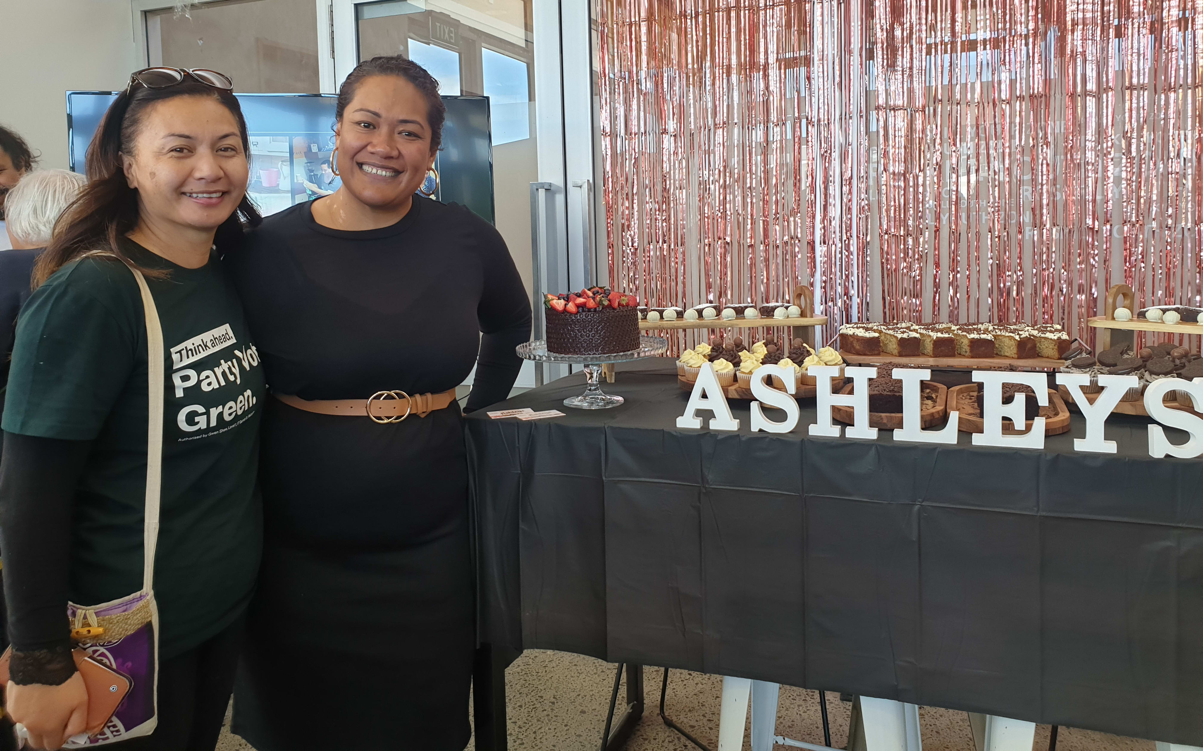 Green Party co-leader Marama Davidson with Tuli Vaivai-Ainea of local cake-making business Ashley's.