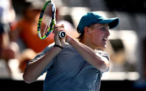Isaac Becroft of New Zealand plays a backhand during his first round match against Zizou Bergs of Belgium during day one of the ASB Classic men's singles.