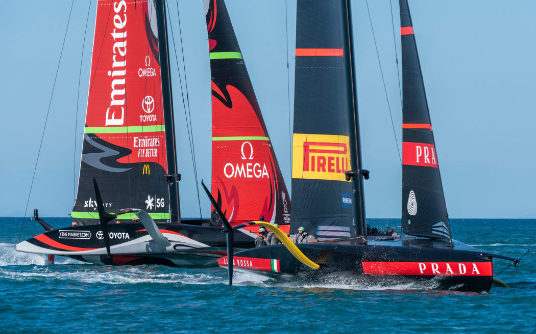 Luna Rossa Prada Pirelli Team  and Emirates Team New Zealand come together in the pre start.