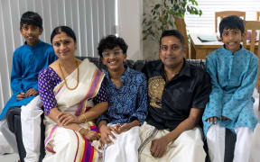 Sreekanth Vidyadharan (second from right) with Dhanya Sreekanth and their children Jagan (middle) and twins Darshan and Devan at their Auckland home.