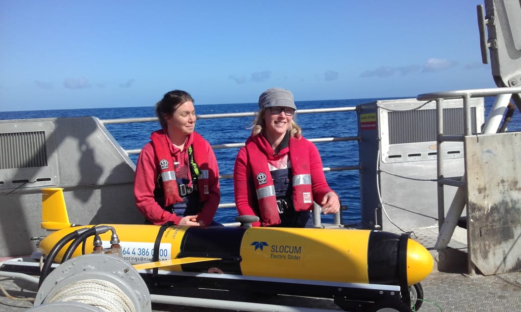 Happy reunion: NIWA oceanographer Joanne O'Callaghan (right) and technician Fiona Elliott with the glider Manaia.