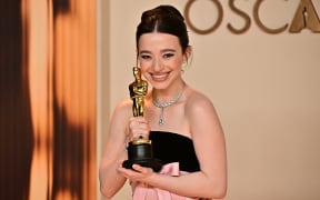 US actress Mikey Madison poses in the press room with the Oscar for Best Actress in a Leading Role for "Anora" during the 97th Annual Academy Awards at the Dolby Theatre in Hollywood, California on March 2, 2025. (Photo by Frederic J. Brown / AFP)