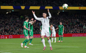 Portugal's forward Cristiano Ronaldo reacts during the men's football 2026 World Cup Group F qualifier between Ireland and Portugal at Aviva Stadium in Dublin on November 13, 2025. (Photo by Paul Faith / AFP)