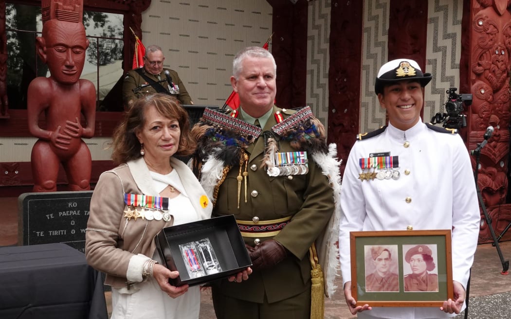 Rhonda Lepper and her mokopuna RNZN Ensign Jett Hunia with Chief of Army Major General John Boswell.