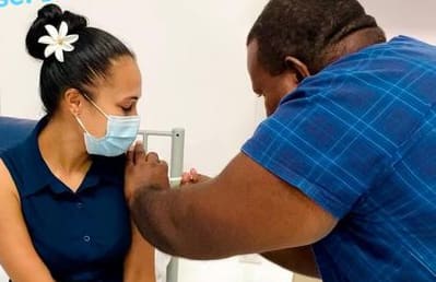 Gladys Habu, a pharmacist and former Miss Solomon Islands, getting her second dose of Covid-19.