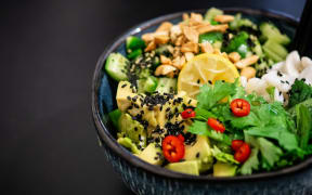 A colourful big bowl of fresh salad.